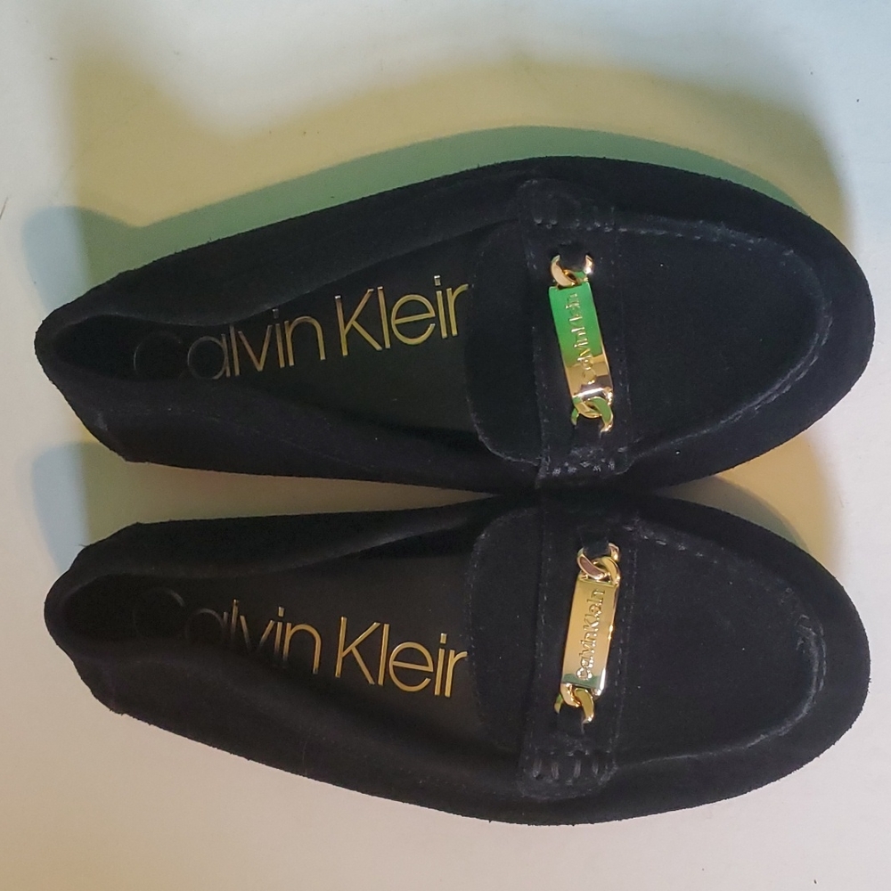 Calvin Klein women's 6.5 black leather shoes with gold front name plate